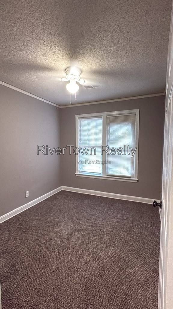 Charming 2-Bedroom Duplex Retreat on Bowen Avenue - Cozy Living Awaits! property image
